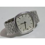 A gentlemans wristwatch - a 1970s stainless steel manual wind bracelet wristwatch, unsigned, with
