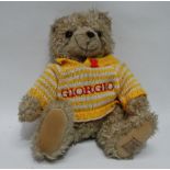 Giorgio of Beverly Hills collectors bear - for 1996, wearing a yellow and white jersey, seated,