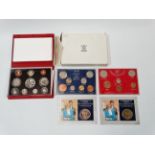 Coins - a deluxe ten coin set, together with other coin sets.