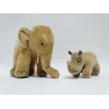 A 20th century plush elephant - possibly Steiff, blond with bead eyes and painted detailing,