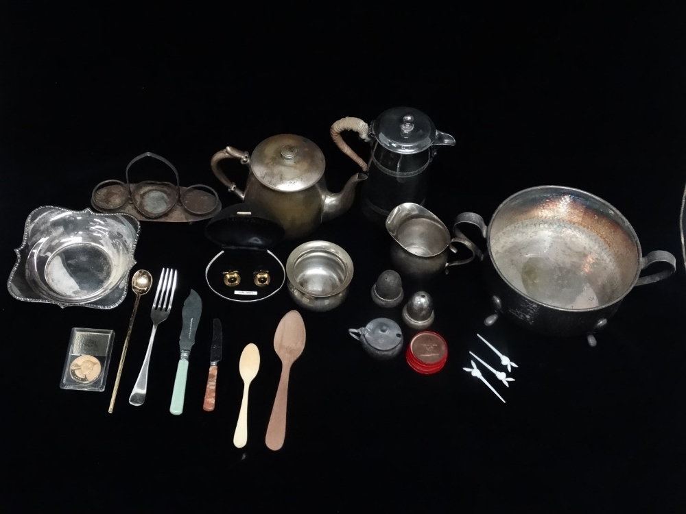 A quantity of platedware - mostly 20th century, with teapot, hot water jug and a dish ring