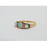 An opal and diamond dress ring - claw set in 18ct yellow gold, size M, weight 3.5g.