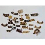 Militaria - a quantity of military shoulder titles.