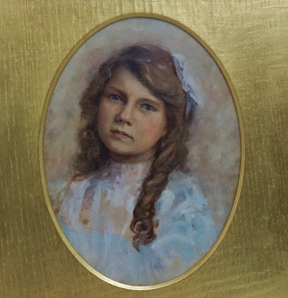 Early 20th Century British School Portrait Of A Young Girl Oil on canvas Framed as oval Framed and