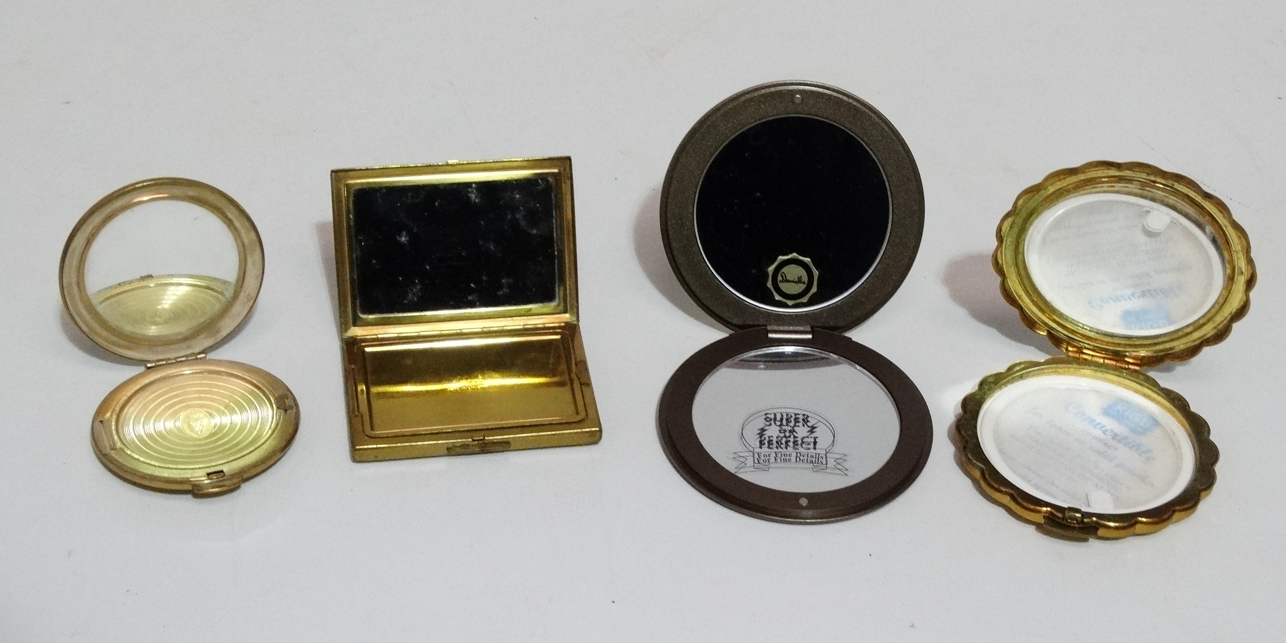 A Swarovski crystal compact - together with three further mid 20th century compacts (4) - Image 6 of 7