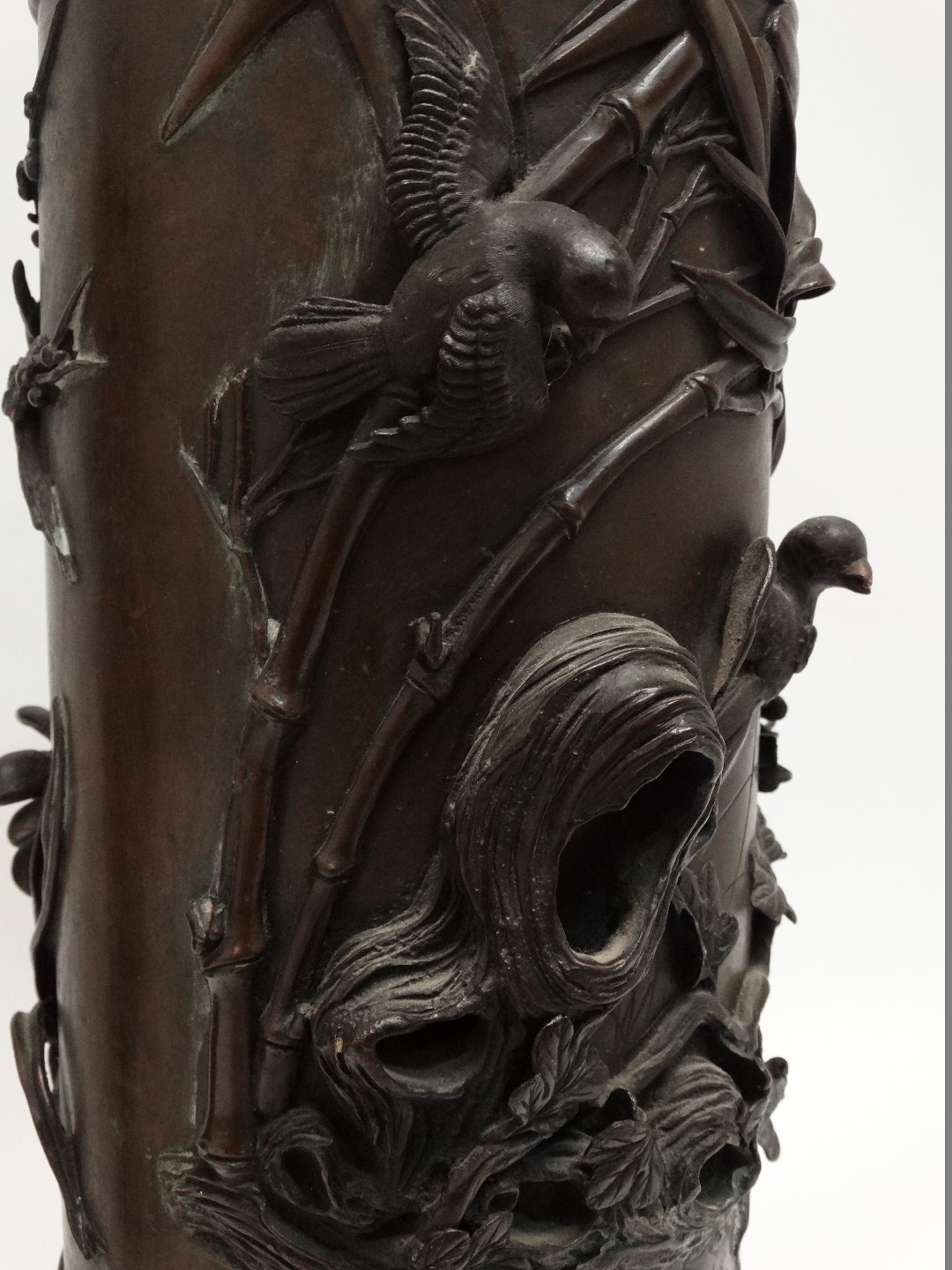 A pair of Meiji period bronze vases - extensively decorated with birds on cherry blossom, height - Image 6 of 6