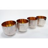 Four silver tumblers - Dublin 1969, Royal Irish Silversmiths Ltd., with gilt interiors, 14oz, (4)