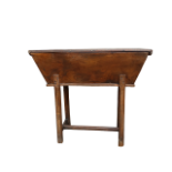 An 18th century elm dough bin - of typical form raised on chamfered square legs, joined by an H