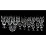 A set of 20th century Waterford crystal glasses - including eleven tumblers on short foot, ten