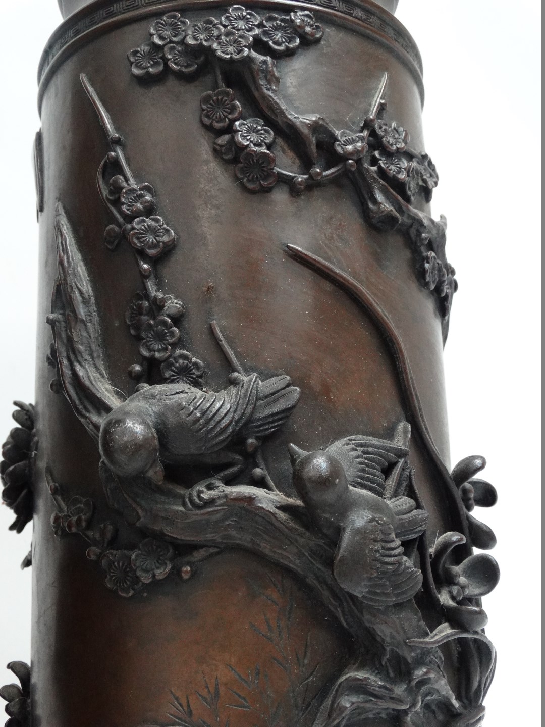 A pair of Meiji period bronze vases - extensively decorated with birds on cherry blossom, height - Image 3 of 6