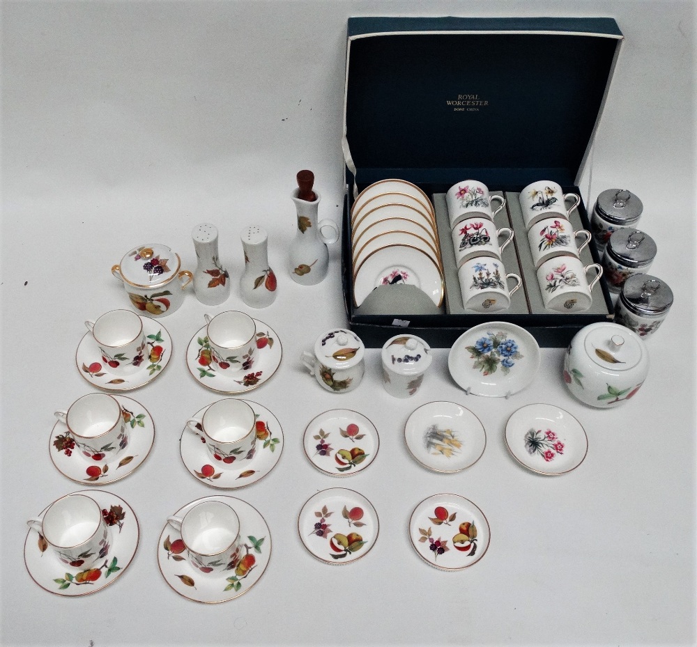 A Royal Worcester coffee service of six place settings - boxed, the cans and saucers decorated