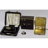 A child's silver pusher and spoon set - Birmingham 1963, boxed, together with a silver cigarette