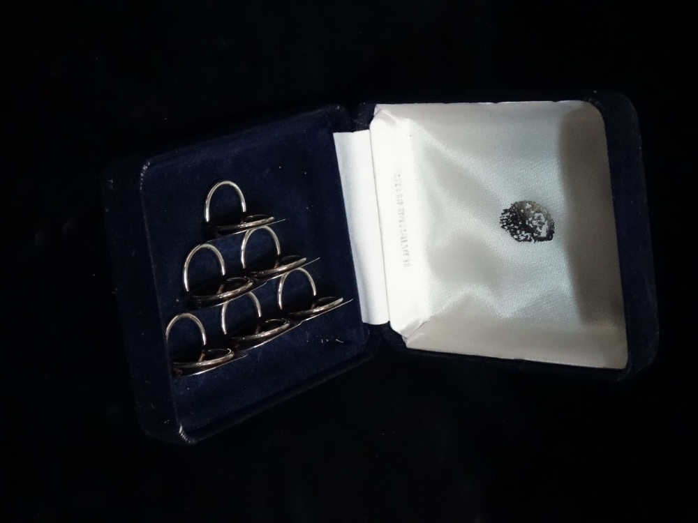 A boxed set of silver menu holders - of rounded rectangular form with engine turned border, London - Image 2 of 2