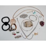 Costume jewellery - to include a late Victorian silver cuff, a silver torc necklace etc.