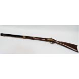 A reproduction of a 19th century muzzle load musket - smooth bore with percussion cap action and