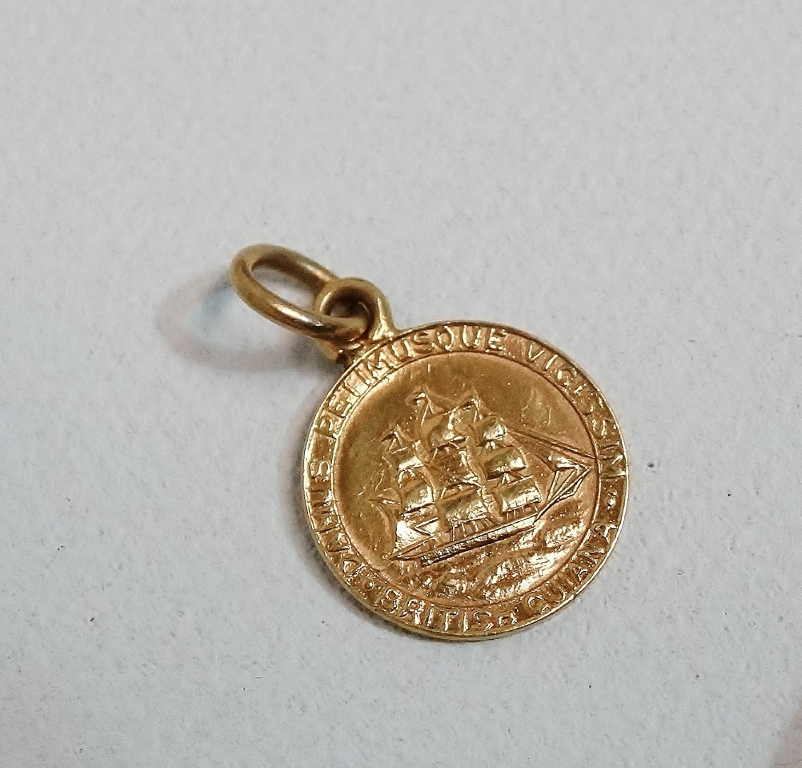 A West Indies British Guiana gold 'dollar' souvenir madalet - mounted on a suspension ring, undated, - Image 7 of 7
