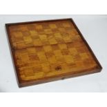 A 19th century Anglo Indian chess/backgammon board - possibly padauk, the rectangular hinged box