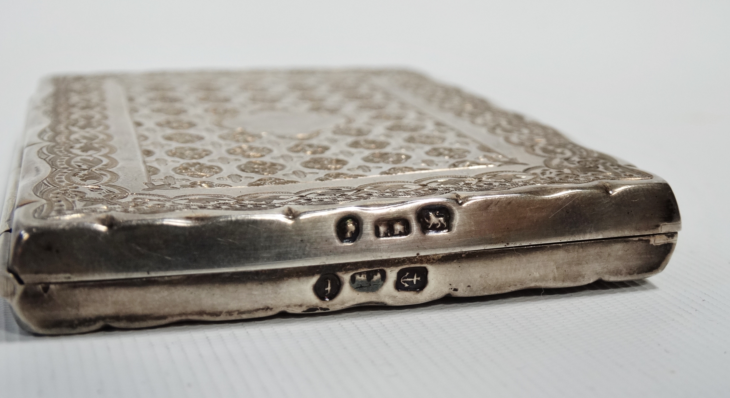 A silver note and card case - Birmingham 1880, rectangular engraved with foliage, 3oz (all in) - Image 3 of 4