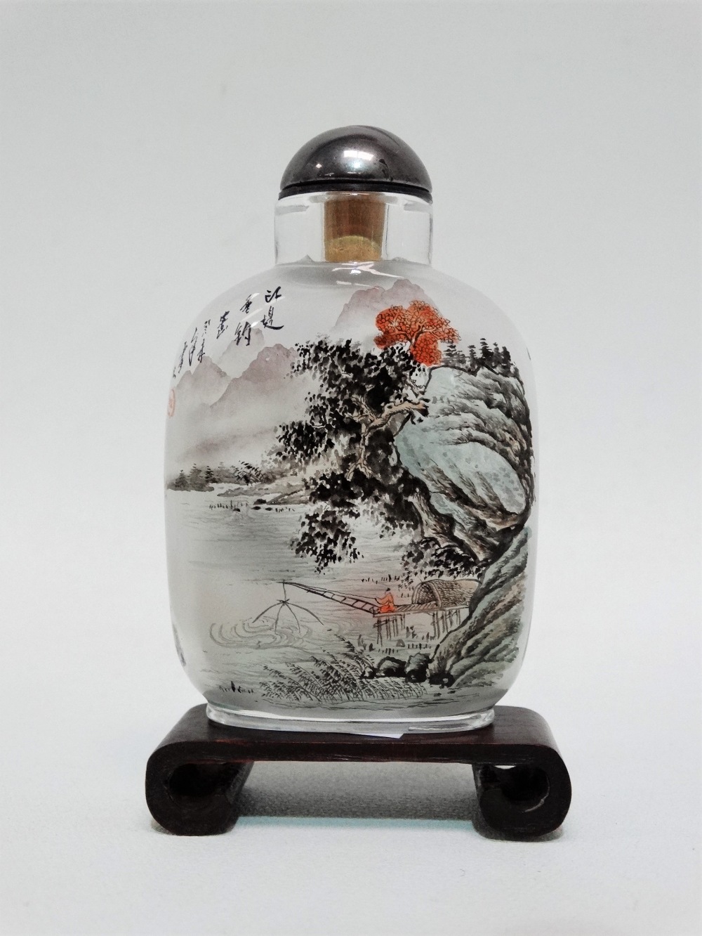 Chinese glass snuff bottle and stopper - reverse painted with a river scene, with stand, height 9cm, - Image 3 of 7