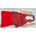 An early 20th century 'Flapper' dress - red silk, detailed with sequins and beads, including a red