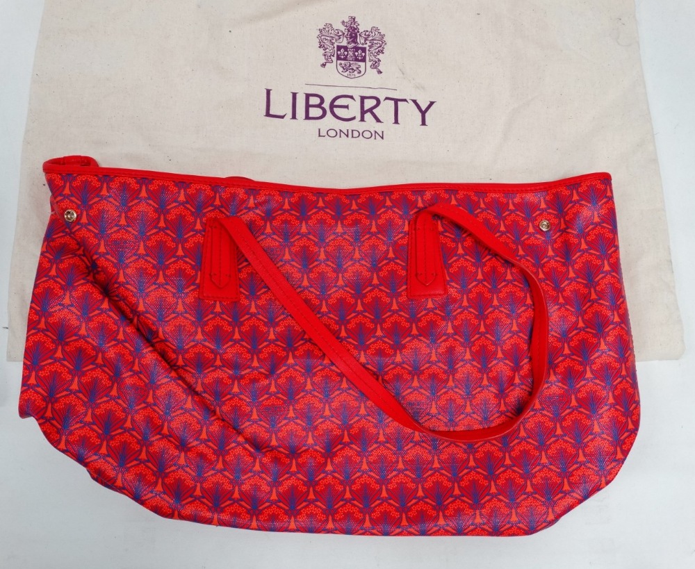 A Liberty Iphis pattern tote bag - red leather binding and handles, with wardrobe bag, together with - Image 4 of 4