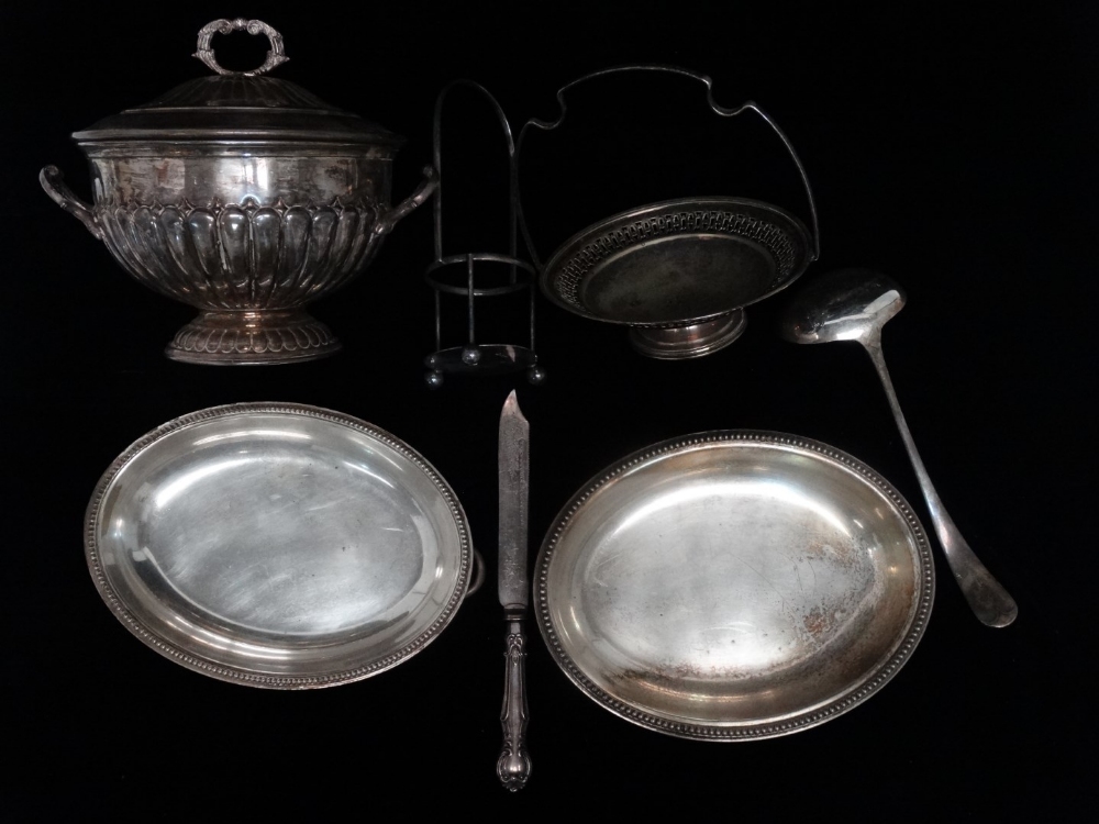 A silver plated tureen - of part gadrooned form with twin handles and cover, diameter 21cm, together