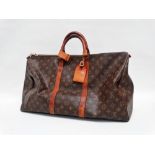 Louis Vuitton grip bag - monogrammed canvas, with tan leather handles and address tag, brass