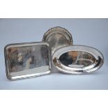 Lot: 3 dishes in solid silver: rectangular (35x47cm), round (dia33cm) and oval (53x31cm)