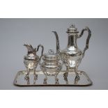 A three-piece coffee set in solid silver on a silver-plated tray, Delheid (jug h29cm)