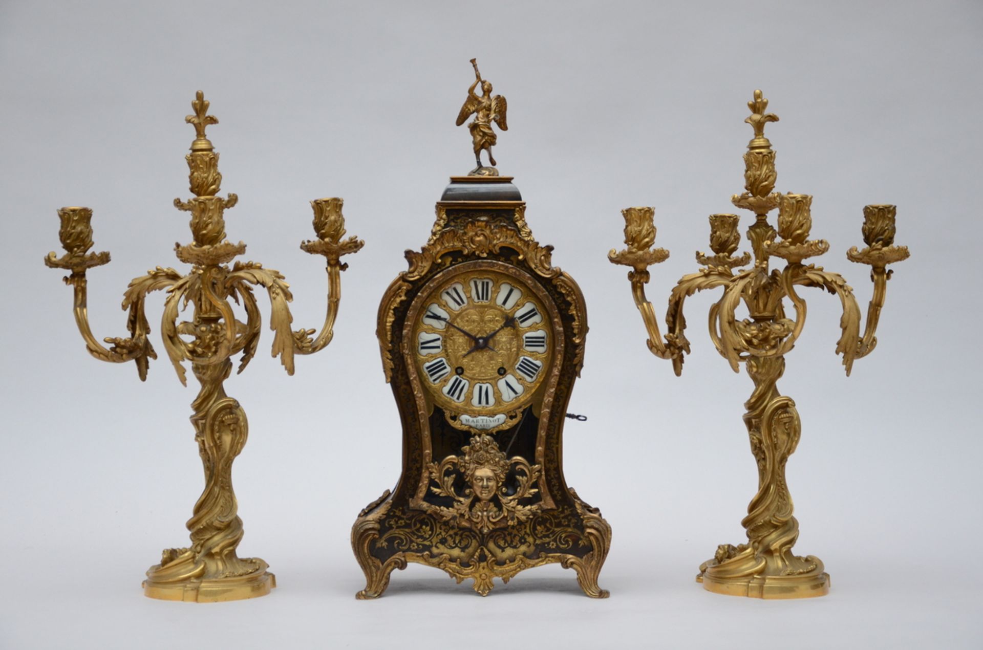 A Napoleon III style cartel clock + a pair of bronze Louis XV style candlesticks (h56cm) (cartel