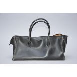 Black leather handbag by Hermes, Paris-Bombay model (21x61cm)(*)