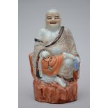 A seated putai in Chinese porcelain (h24cm)