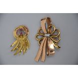 Two golden 18kt brooches (39 grams)