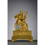 Empire clock in gilt bronze 'musician' (64x41x18cm)