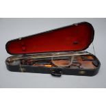 Violin in box with three bows (length 40cm) (*)