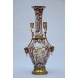 Decorative piece consisting of two Japanese Imari vases with metal mount (h89cm) (*)