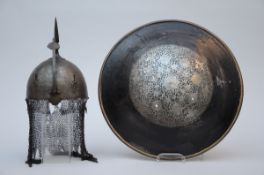 Engraved Indo-Persian helmet and a shield (h28 dia46cm)