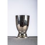 A silver beaker by Wolfers (9.6cm)
