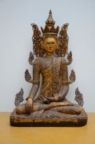A large Burmese Buddha in wood with inlaywork, 20th century (h136cm)
