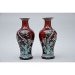 A pair of Chinese sang de boeuf vases with famille rose decoration (h 38cm) (*)