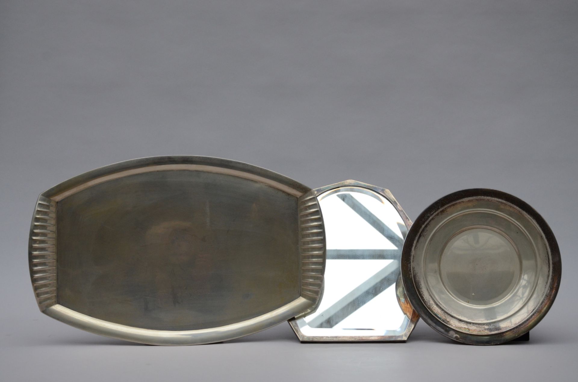 Lot silver: Wolfers table mirror (40x30cm)+ round dish by Wolfers (dia32cm)+ art deco tray (