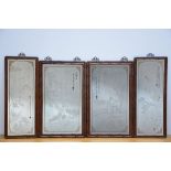 Four Chinese mirrors with engraved decoration in wooden frames (111x45) and (106x65)