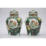 A pair of famille verte lidded vases in Samson porcelain 'flowers' (h42cm)