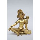 A seated Indra in gilt bronze (28x27x16cm)