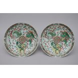 A pair of Chinese famille verte dishes 'Qilins' (dia37cm)
