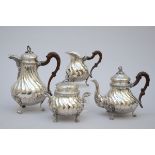 A four-piece silver coffee set in Louis XV style (*)