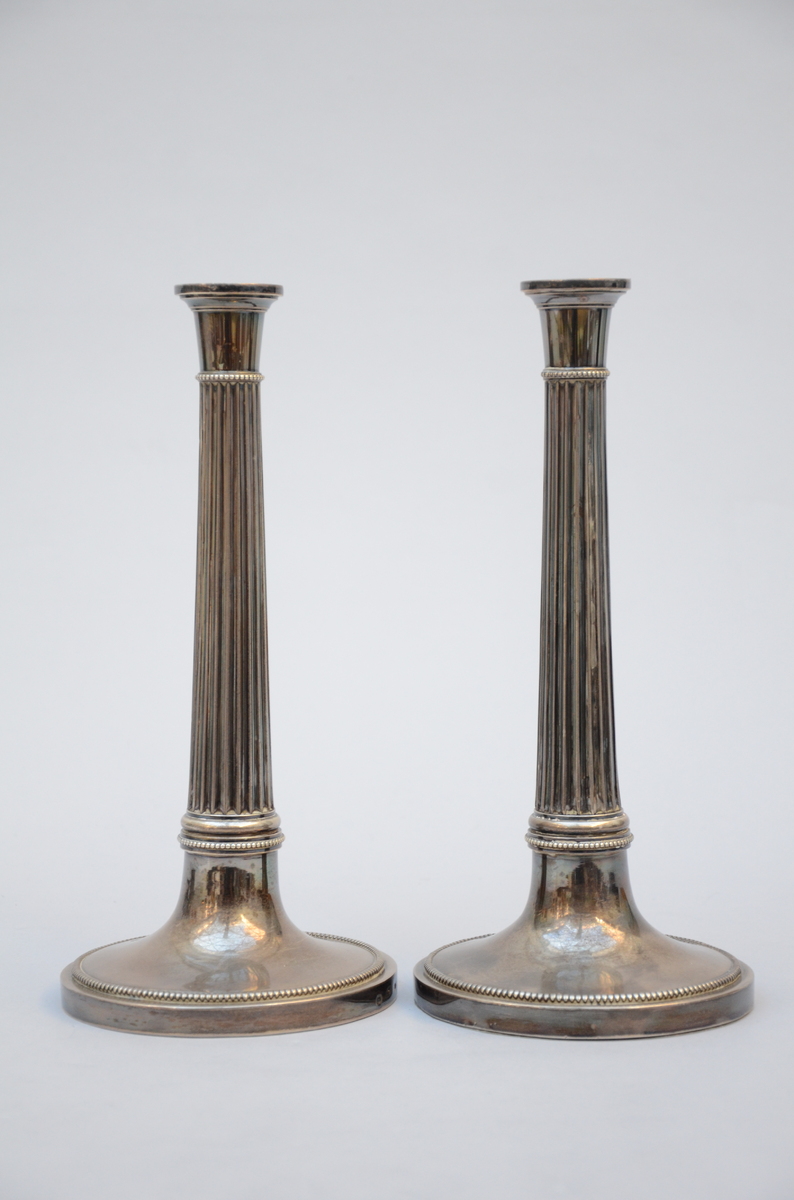 A pair of silver candlesticks, 19th century (h29.5 cm) (*)