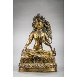 A Tibetan sculpture in copper repoussé 'green Tara', 18th century (h 27 cm)