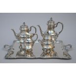 A four-piece silver coffee service on a tray (835/1000)