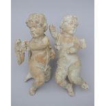 A pair of antique angels in carved wood (h54 cm) (*)